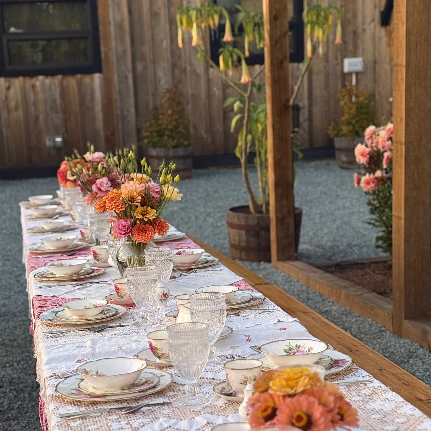 long table with antique china place settings